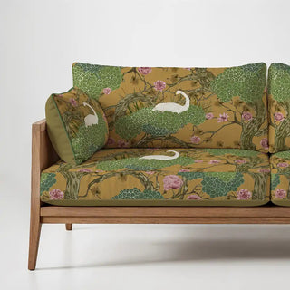 Yellow upholstery fabric for sofas and chairs with a swan and peony Chinoiserie pattern