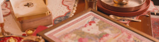 Life n Colors gift sets — handcrafted table linen and decor accents presented in gold-foiled maroon gift boxes