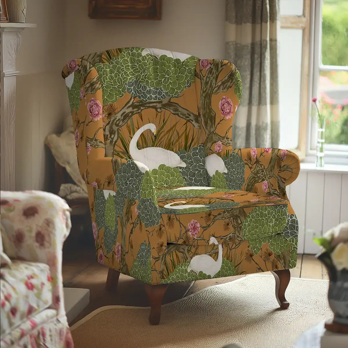 Yellow swan-and-peony upholstery fabric shown as a furnishing length