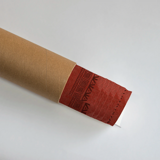 Rolled Chitra Indian Warli Painting Wall Art Poster showing detailed tribal border patterns in red tones, perfect for framing or gifting.