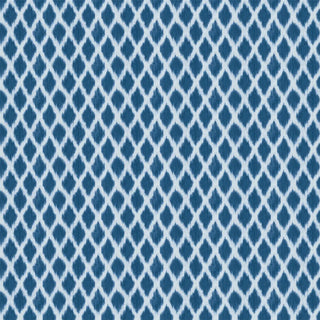 Blue and white geometric patterned wallpaper roll