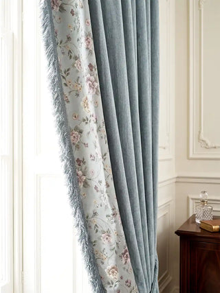 Eternal Garden Readymade Curtain readymade curtain, detailed view of the curtain panel softly cascading, emphasizing the elegant, high-contrast transition between the solid, textured light blue main fabric and the sm...