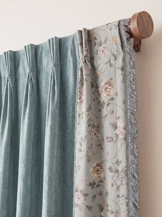 Eternal Garden Readymade Curtain readymade curtain, focused view of the curtain's top edge, illustrating the professional pinch-pleat tailoring. The header hangs crisply from a wooden rod with metal brackets, clearly...