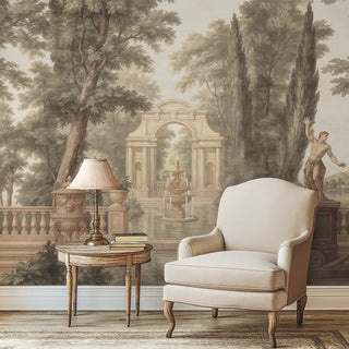  A living room or study featuring a detailed, black-and-white mural wallpaper that depicts a classical European garden scene.