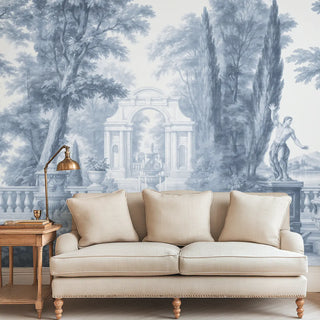 Beige sofa in a room with classical mural wallpaper