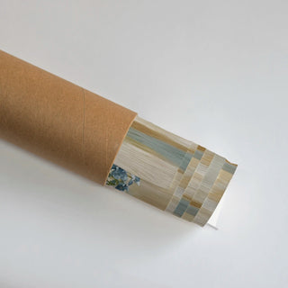 Rolled Floral Reverie European Wall Art Poster showing soft pastel hues and blue floral patterns, perfect for gifting or sophisticated wall decoration.