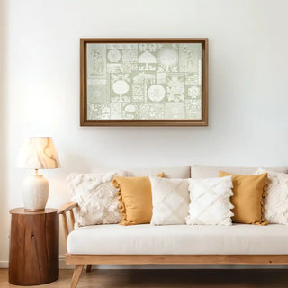 Geet Madhubani Vintage Light Green Indian Wall Art framed above a beige sofa with mustard and cream cushions, creating a calm and earthy interior accent.