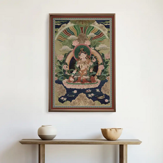 Green Tara Buddhist Indian Wall Art displayed above a minimalist console with pottery décor, blending traditional Indian spirituality with modern design.