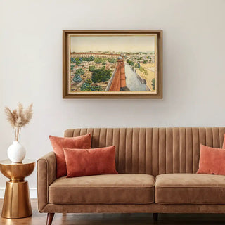 Imperial Delhi Vintage Indian Wall Art framed above a tan velvet sofa with rust cushions, adding an artistic heritage charm to modern interiors.