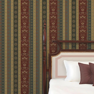 Decorative wallpaper with striped pattern and a bed with pillows.