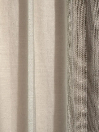 Kanan Readymade Curtain readymade curtain, This close-up emphasizes the distinct textural contrast and precise stitching where the two primary materials meet. It beautifully captures the soft, matte, and natural grai...