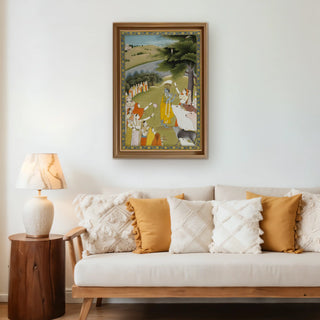 Krishna with Gopies Indian Vintage Wall Art framed above a cream-toned sofa with warm cushions, blending classical Indian artistry with modern home aesthetics.