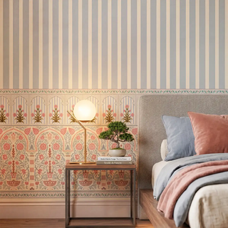 The Kusum wallpaper mural in a bedroom, showcasing the elegant Indian floral and Jharokha pattern behind a bed. view-bedroom