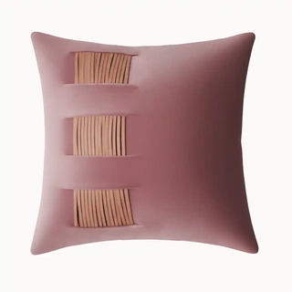 Leather Ridges Cushion Cover: Front view of the mauve velvet cushion showing three horizontal slash details with contrasting tan fringe.
