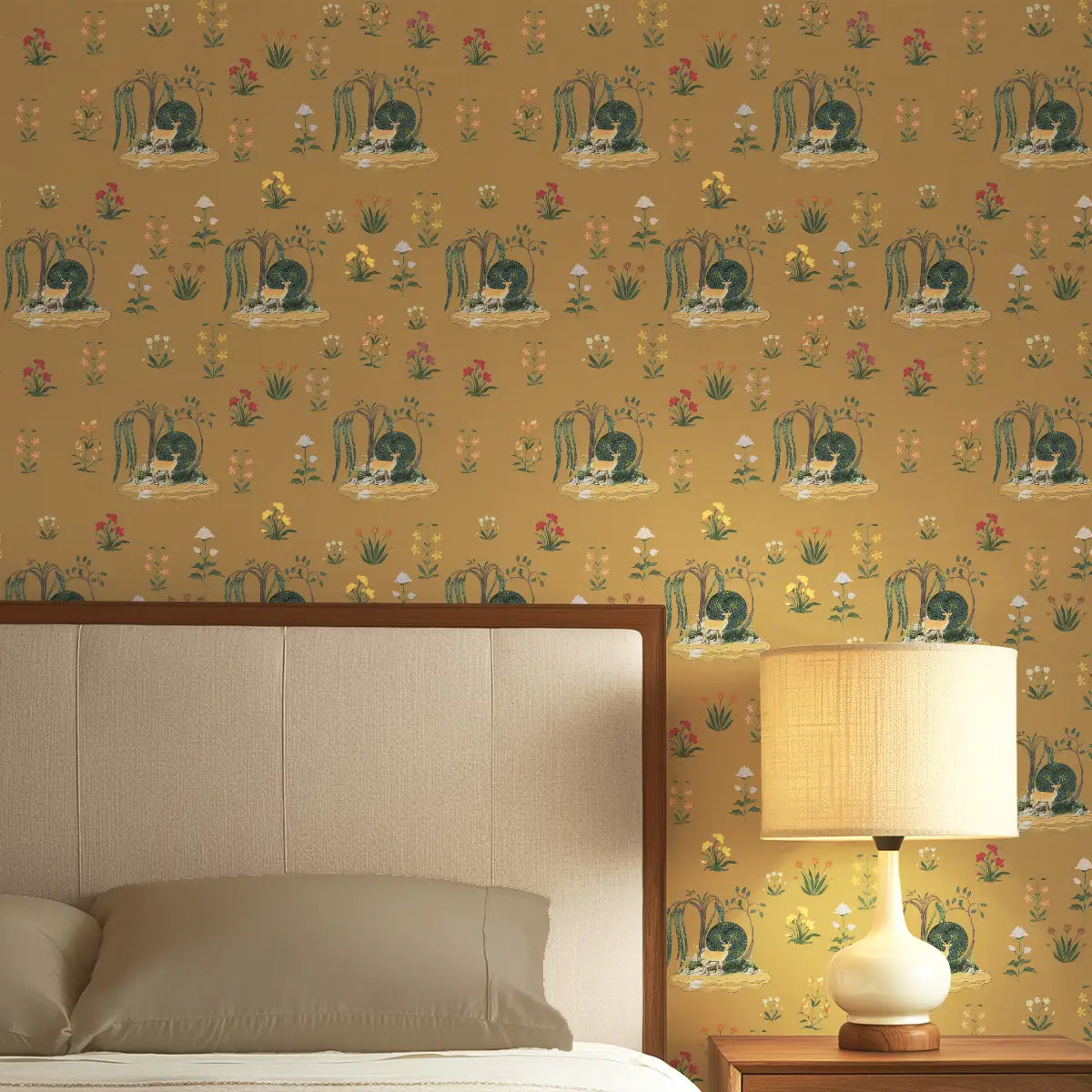 Malhar Indian wallpaper in mustard colour on a bedroom accent wall behind a wooden bed