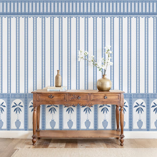 Monsoon Arches Stripes Wallpaper: Full wall installation of the blue striped wallpaper with palm arch decorative panel border in an entryway.