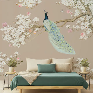 Bedroom with a peacock wall decal and cherry blossom branch on a beige wallpaper