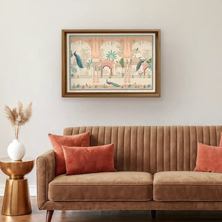 Mughal Garden With Peacock Indian Wall Art framed above a brown velvet sofa with rust cushions, infusing the living space with Indian royal charm.