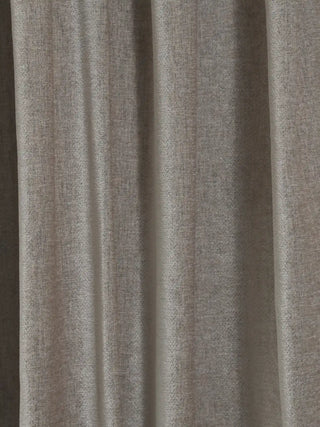 close-up detail showing the premium organic slubbed texture of the oatmeal linen used in the Olivia curtain.