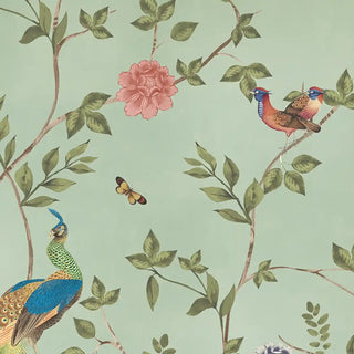 Colorful peacock wallpaper on a light green background with leaves
