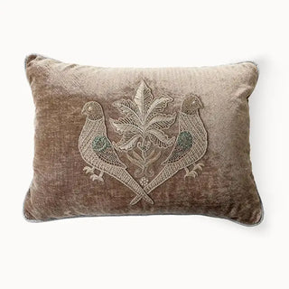 Front view of rectangular parrot embroidered velvet cushion.