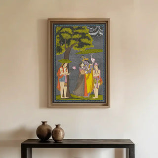 Radha Krishna Vintage Indian Wall Art displayed above a minimalist console with earthy décor, bringing spiritual grace and artistic warmth to the space.