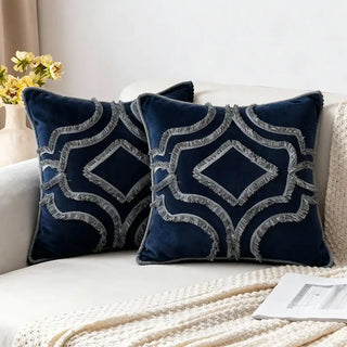  Regal Crest Fringe Cushion Cover: Navy blue chenille cushion with textured fringe embroidery. Styled on a cozy neutral sofa.