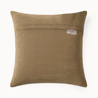 Back view of  Saddle Line Cushion Cover with a visible brand label on a white background
