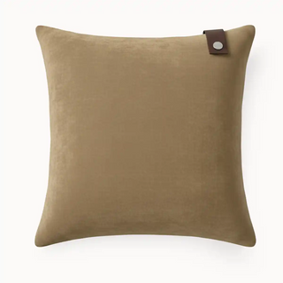 Front View of Saddle Tag Cushion Cover with brown velvet cover and dark brown tag