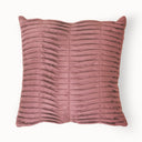 Silk Route Pleated cushion cover in warm earthy tones, styled in a living room setting.