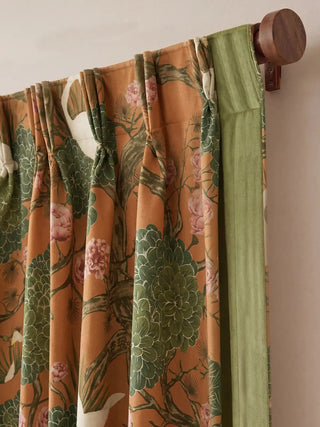 Silk Route Readymade Curtain in Ochre and Sage readymade curtain, detailed close-up of the top header, highlighting the professional pinch-pleat tailoring. The curtains hang gracefully from a classic wooden rod, clea...