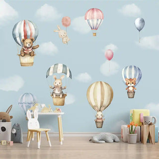 Sky Dreams kids wallpaper styled in a cozy playroom with pastel furniture and soft toys, featuring adorable animals floating in balloons.