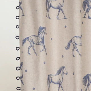 Fabric detail of Stallion Readymade Curtain highlighting intricate horse illustrations and soft woven texture.