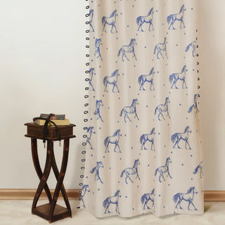 Full view of Stallion Readymade Curtain featuring elegant blue horse motifs on a neutral beige background with loop details.
