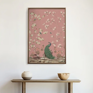 Framed Gentle Garden European Wall Art above a minimal console table, showcasing its refined peacock and floral detailing.