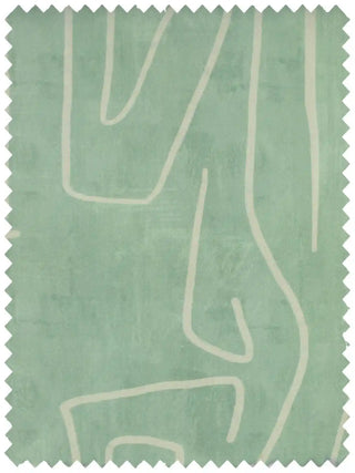 Fabric sample with abstract white line design on a light green background