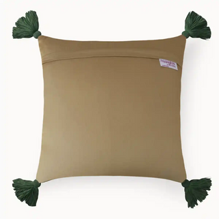 Back view of Akriti cushion cover in warm khaki with four large forest green corner tassels and a concealed zip closure on a white background