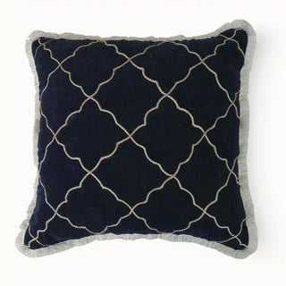 A direct front-facing view of the Amer Lattice cushion highlighting the symmetrical gold quatrefoil trellis pattern.