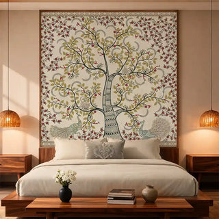 Anant Vriksha Tree of Life kalamkari wallpaper in beige as a framed headboard panel above a low bed flanked by rattan pendant lights