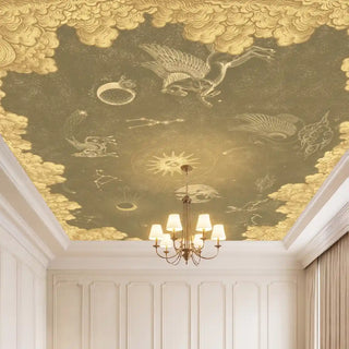 The Celestial Veil astronomical wallpaper styled on a high ceiling around an opulent crystal chandelier.