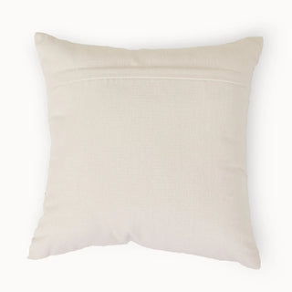 The back view of the Ari Garden ivory cushion cover showing the secure hidden flap closure and clean finish.