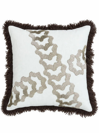 The front of the Aurea cushion cover: a diagonal chain of scalloped rings in champagne-toned embroidery on ivory, edged with a deep brown brush fringe.