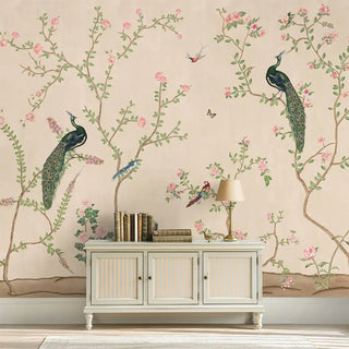 Bagiya Wallpaper with peacock and floral design in a room with a cabinet and lamp.