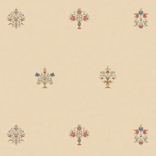 A close-up view of the beige wallpaper, highlighting the fine details of the colorful Indian motifs.