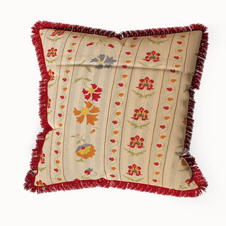 A back view of the Bela Fringes cushion cover, showing its full shape and the detailed floral pattern.