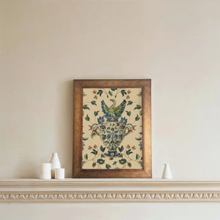 A framed Black Pearl Wall Art featuring an ornate floral vase design, displayed above a minimal console on a neutral wall.