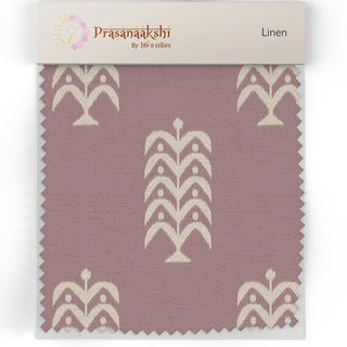 Fabric swatch of Bloomark Upholstery Fabric showing mauve base with bold white prints.
