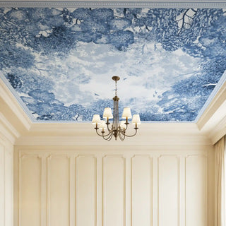 Blue Nest Ceiling Wallpaper: Full room view of the blue and white ceiling mural showing a dense tree canopy and chandelier.