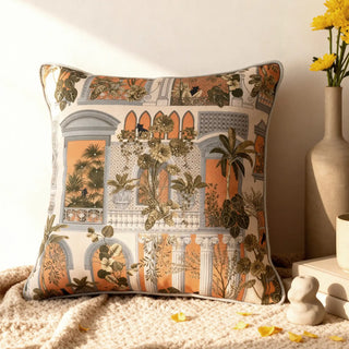A styled vignette featuring the Cattitude cushion cover next to yellow flowers and decor books