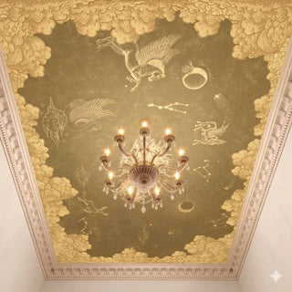 The Celestial Veil sage green custom mural styled on a dining room ceiling behind a classic brass chandelier.
